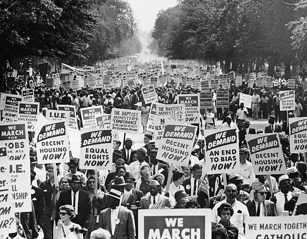 What is redlining? Protestors in 1963 march on Washington DC to protest discrimination including housing policies like redlining.