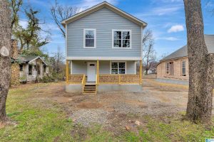 805 48th St N, Birmingham, AL. New Construction house with gray siding and large front porch