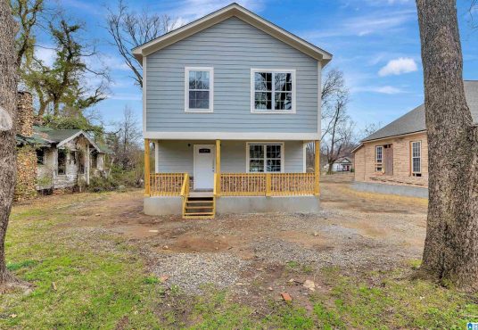 805 48th St N, Birmingham, AL. New Construction house with gray siding and large front porch
